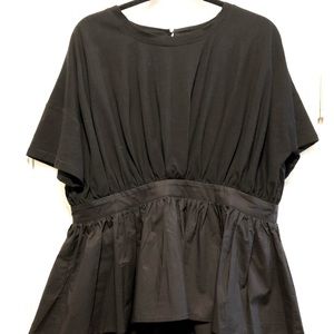 Black High Low Peplum Top.  Super sexy with a back slit and a self-tie bow.